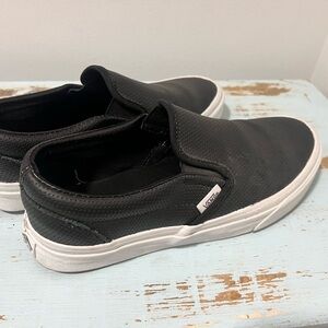 Vans Black and White Slip-On Sneakers